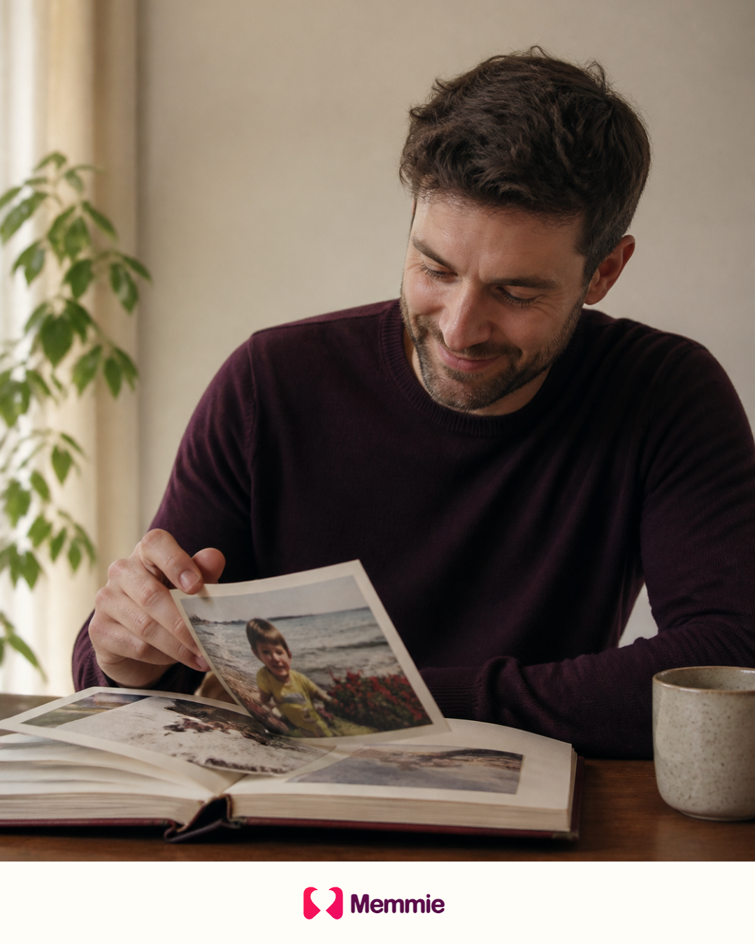 A man rediscovering a childhood photograph in a family album.
