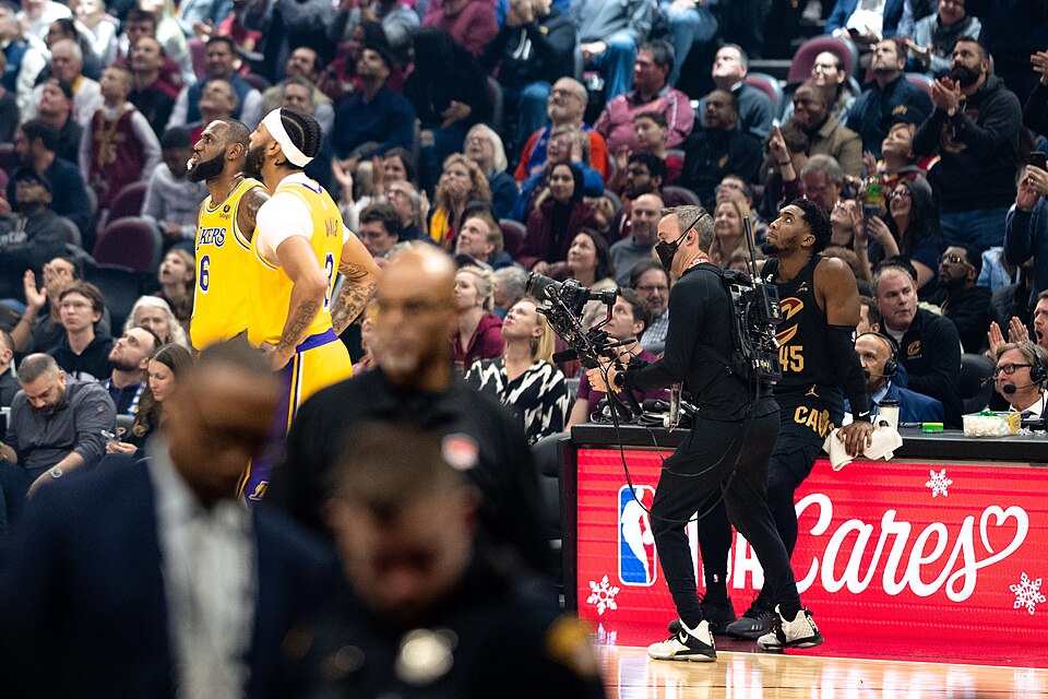 Father and son share an NBA court