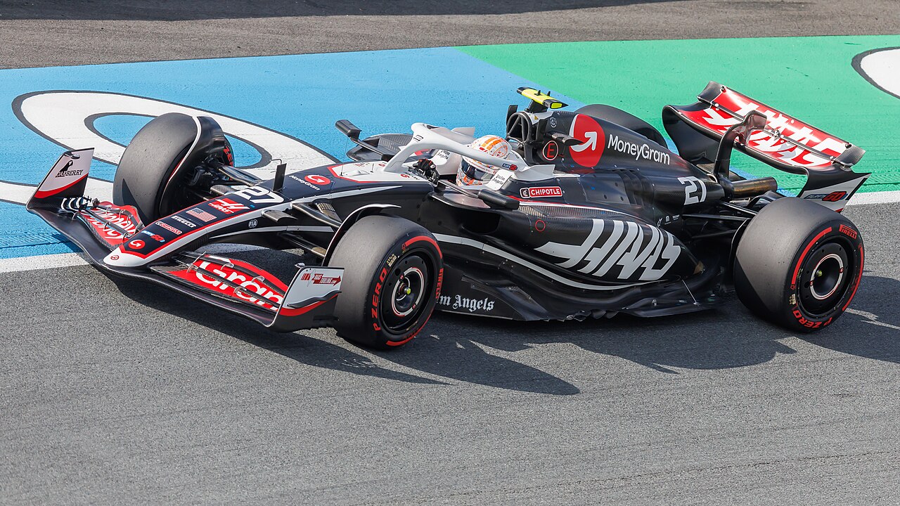 Modern Formula 1 car racing at speed