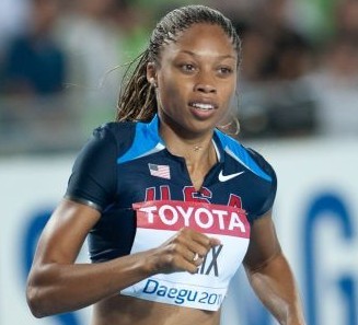 Returns to win two world relay titles