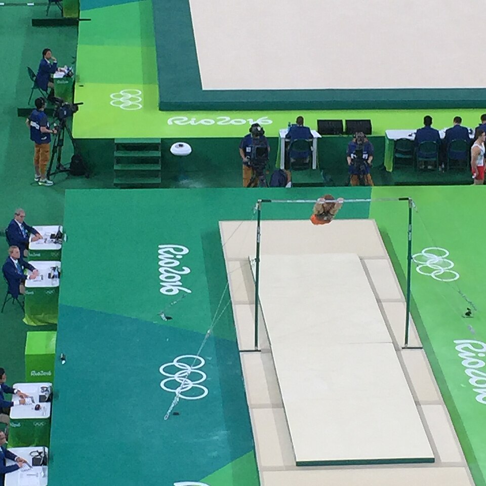 Retains Olympic all-around title