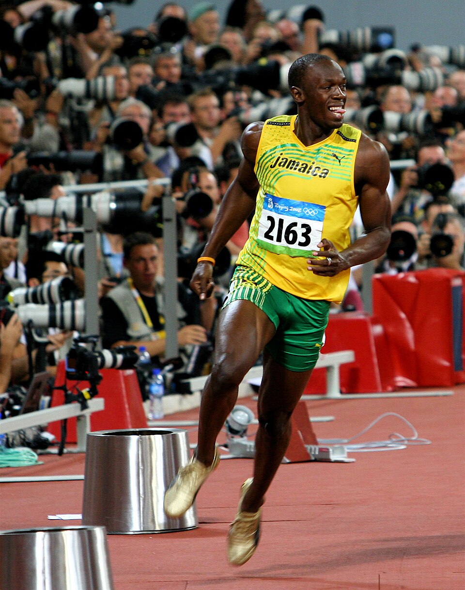 Olympic 100m gold and record