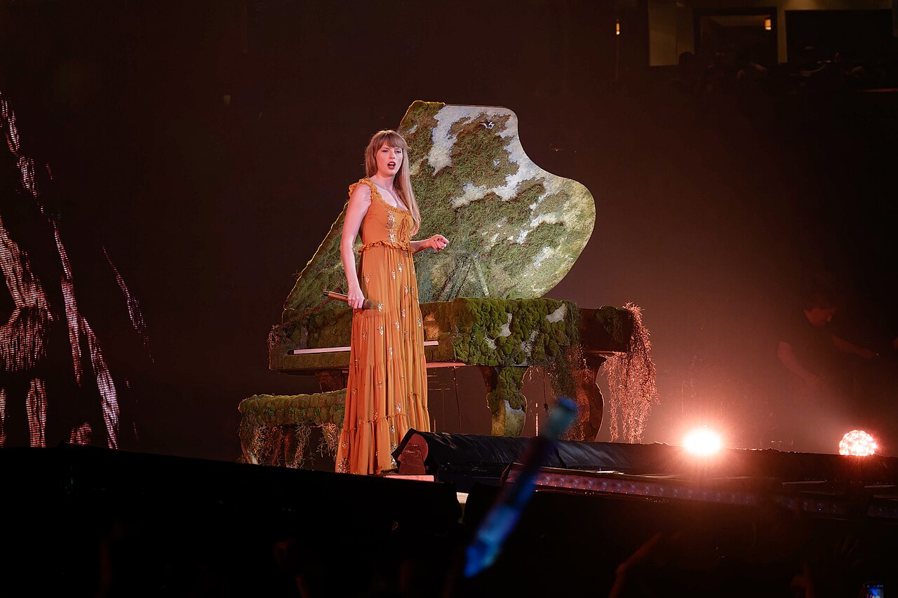 Taylor Swift performing on The Eras Tour